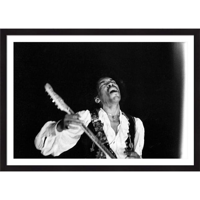 jimi-hendrix-performs-at-monterey-1-framed-print