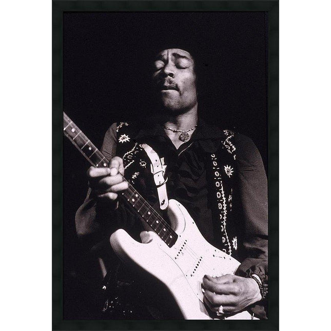 jimi-hendrix-performs-framed-print