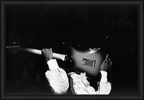 jimi-hendrix-performs-at-monterey-framed-print