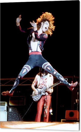 mick-jagger-jumping-ron-wood-performing-live-onstage