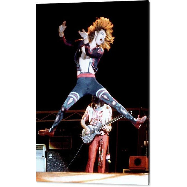mick-jagger-jumping-ron-wood-performing-live-onstage