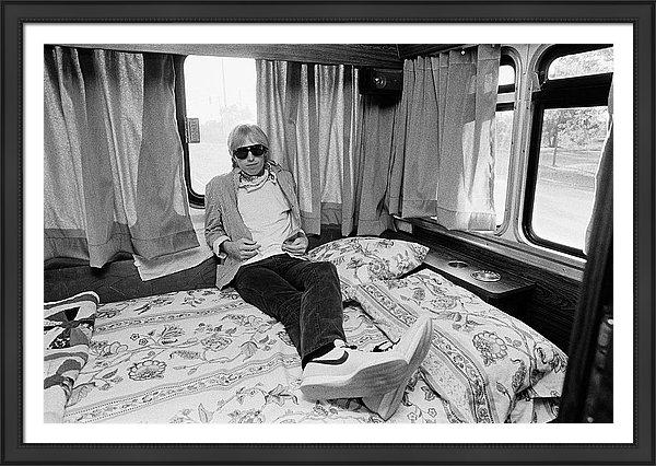 tom-petty-poses-in-his-tour-bus-framed-print