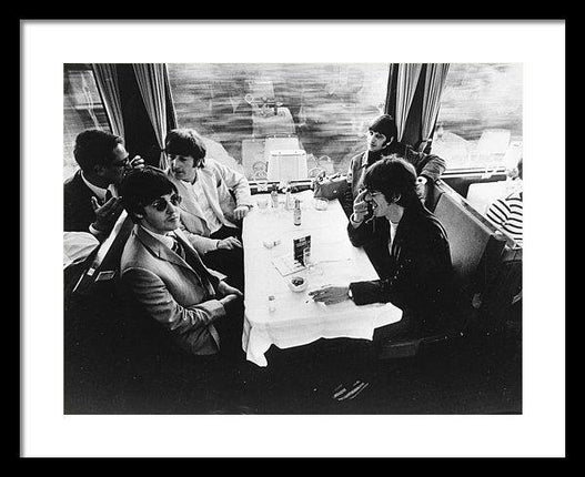the-beatles-relax-in-the-buffet-car-of-a-train