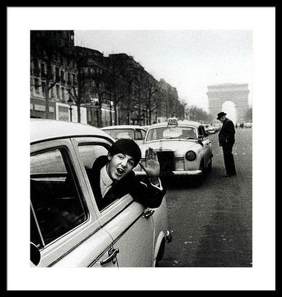 the-beatles-january-1964-paul-mccartney-waves-from-a-taxi