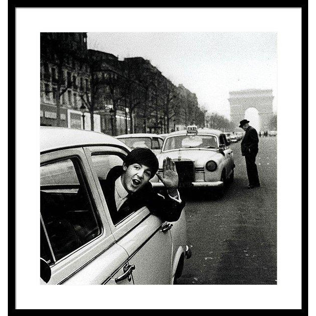 the-beatles-january-1964-paul-mccartney-waves-from-a-taxi